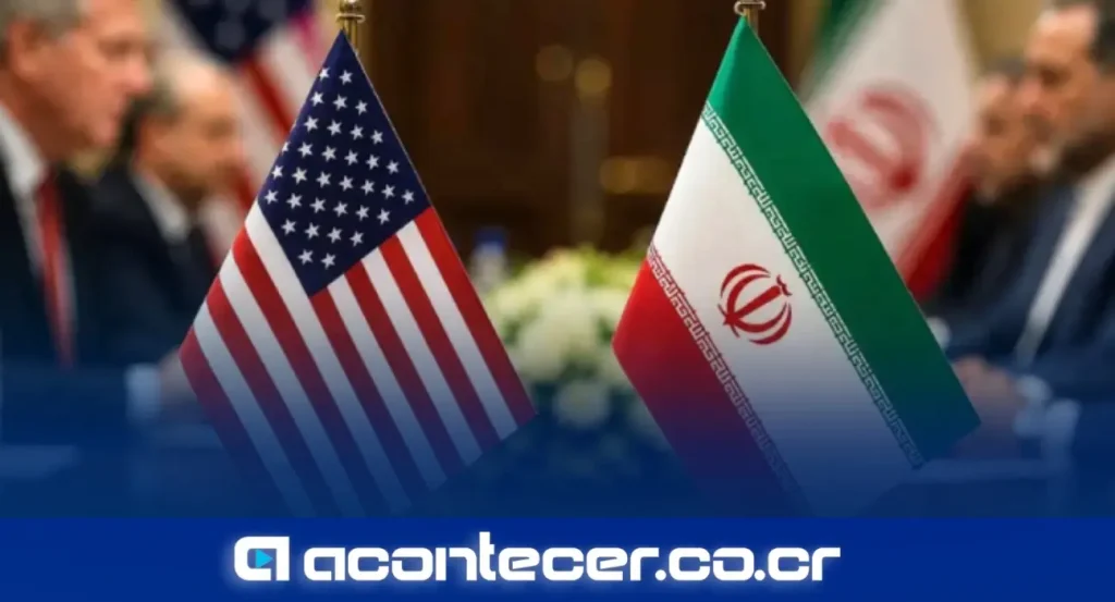 Bandera de Estados Unidos e Irán en una mesa de negociaciones